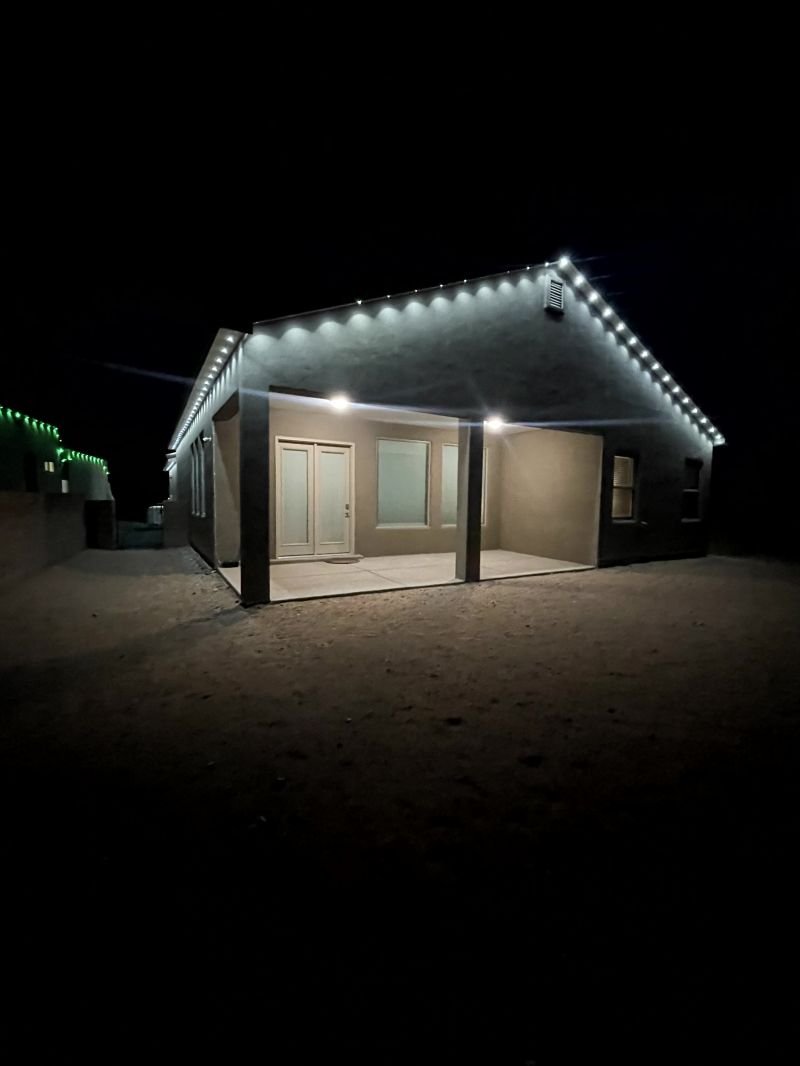 Individually addressable LED points seated in the roofline channel of an Albuquerque home